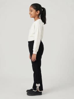 Girls Black Corduroy Flared Trousers with Lace Trim and Bow Accent