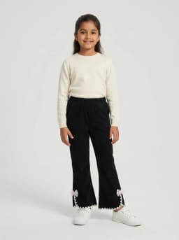 Girls Black Corduroy Flared Trousers with Lace Trim and Bow Accent