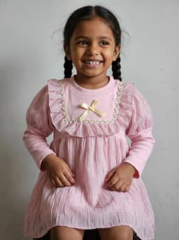 Girls Baby Pink Ruffled Shimmer Long Sleeve Frock with Bow Detail