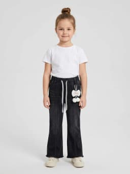 Girls Black Denim Flared Pants with Raw Hem and Charm Accent