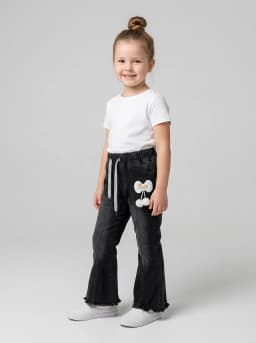 Girls Black Denim Flared Pants with Raw Hem and Charm Accent